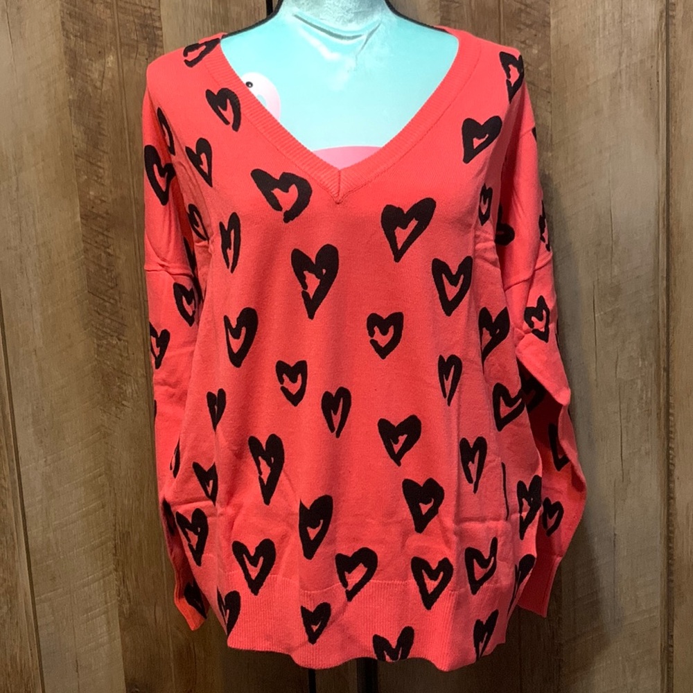 🦋 Brand new, never worn sweater. Deep pink/orange in color with black hearts